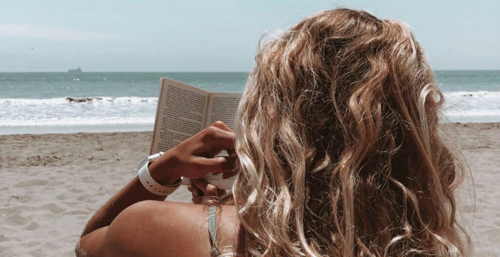 reading book on beach